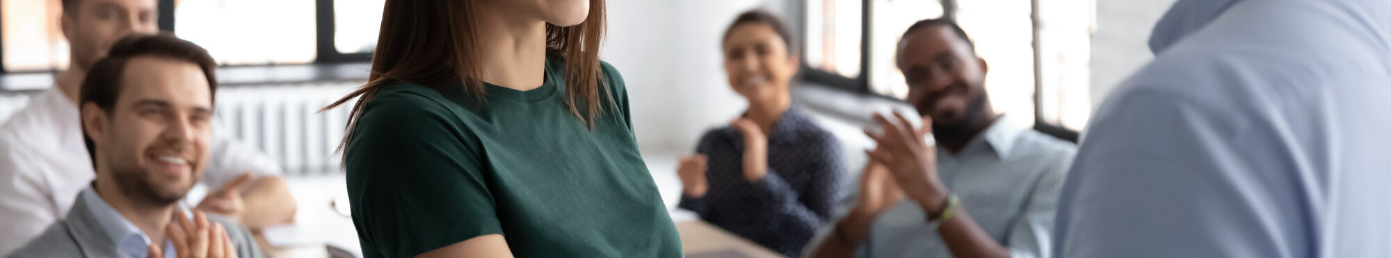 Male boss handshake female employee greeting with success at meeting
