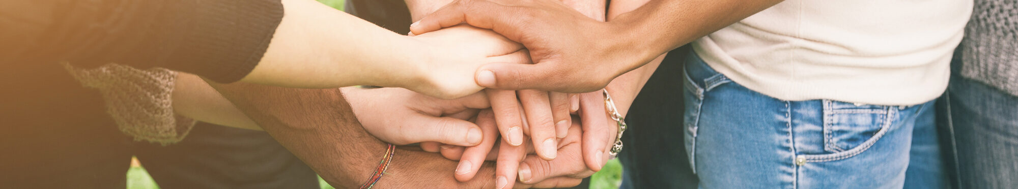 Multiracial Group of Friends with Hands in Stack, Teamwork